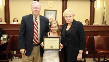 Allison Schecher, won a $100 bond for an essay she wrote about her ancestor who fought in the Civil War. Pictured with Allison are Historic Commission member Glenn Cashion and Freeholder Director Lillian G. Burry. Allison Schecher, won a $100 bond for an essay she wrote about her ancestor who fought in the Civil War. Pictured with Allison are Historic Commission member Glenn Cashion and Freeholder Director Lillian G. Burry.