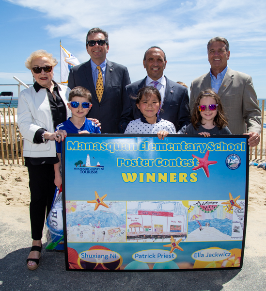 The Board of Chosen Freeholders with the 2018 winners of the Monmouth County Summer Kick off poster contest