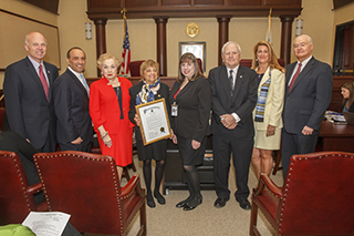 Freeholders present Libralry Week proclamation to Judi Tolchin (center), Renee Swartz and Frank Wells