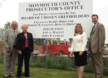 Monmouth County Freeholders stand in front of the new prosecutor's building construction site Monmouth County Freeholders stand in front of the new prosecutor's building construction site