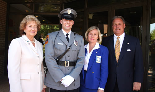 Holmdel patrolman Michael J. Dowens (2nd from left) was congratulated by Freeholder Barbara J. McMorrow, County Sheriff Kim Guadagno and Freeholder William C. Barham 