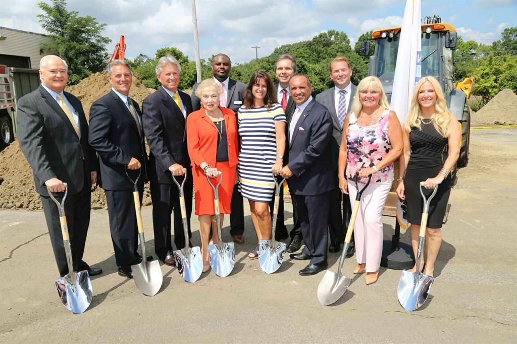 The Monmouth County Board of Chosen Freeholders and other officials at the groundbreaking for the new adult homeless shelter.