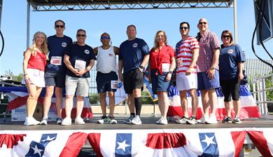 Local and County officials on stage at the Stars & Strides 5k & 1 Mile Freedom Walk Local and County officials on stage at the Stars & Strides 5k & 1 Mile Freedom Walk