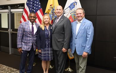 Pastor Akins, Surrogate Raisch, Prosecutor Santiago and Commissioner Anderson in a group photo Pastor Akins, Surrogate Raisch, Prosecutor Santiago and Commissioner Anderson in a group photo